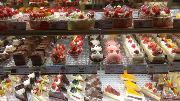 pexels-photo-1236680-1236680 - North Sydney Orthodontics An enticing display of various cakes and desserts in a bakery shop, perfect for sweet indulgence.