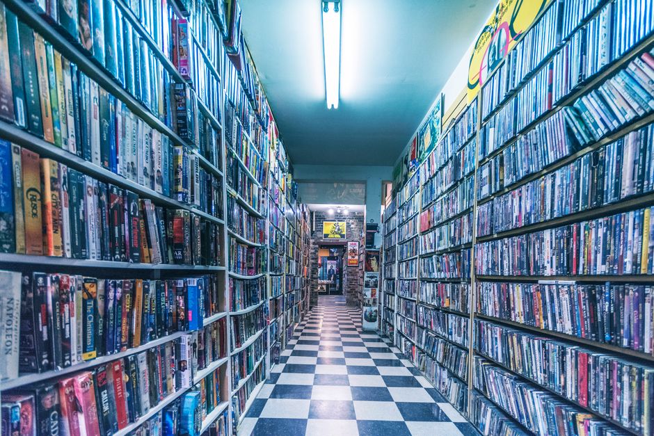 pexels-photo-2973086-2973086 - North Sydney Orthodontics Explore a nostalgic video store aisle filled with classic VHS tapes, capturing retro vibes.